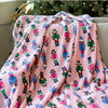 Nutcracker March Soft Throw in Pink